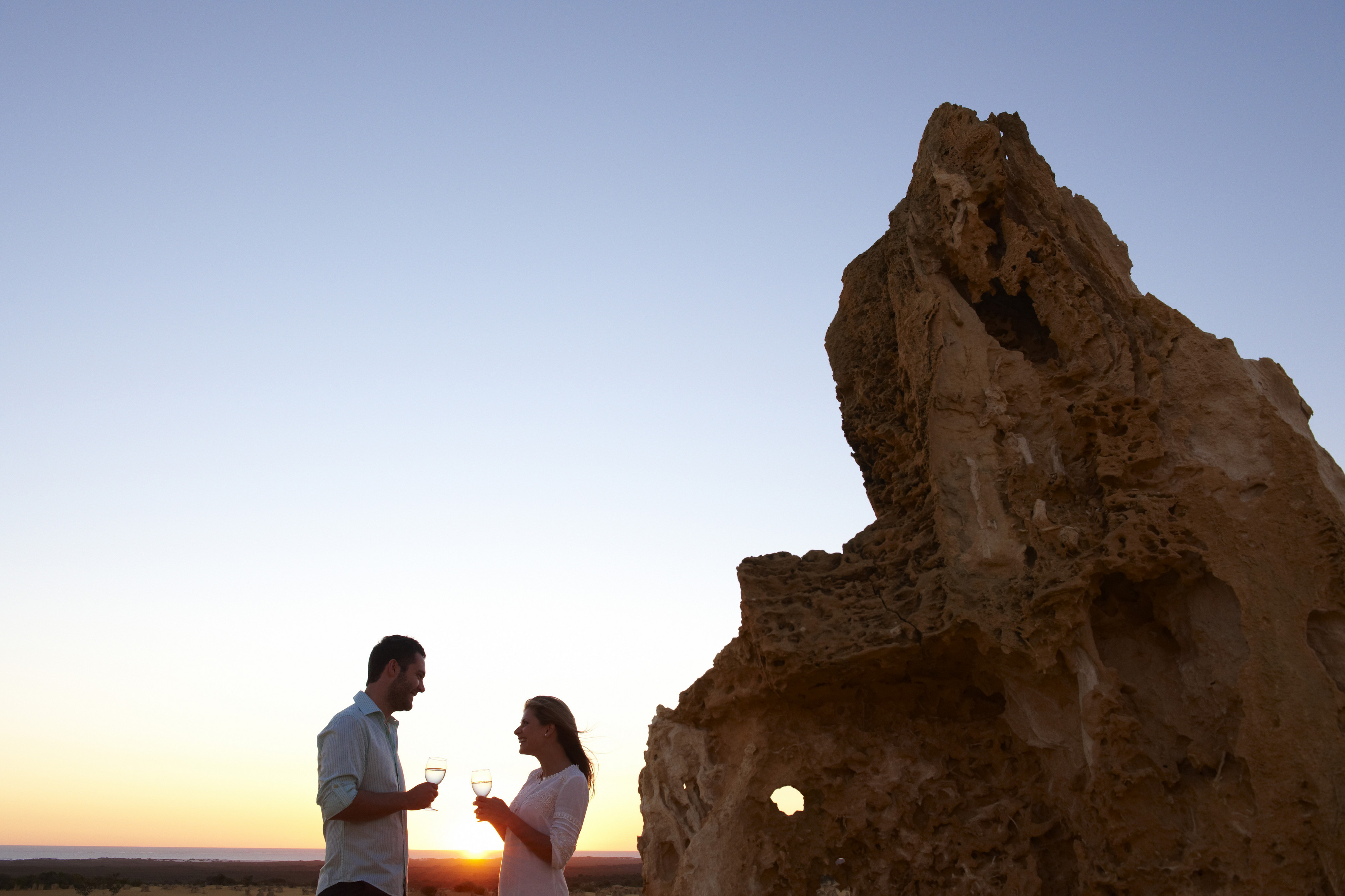 Couple standing next to a Pinnacle in Cervantes