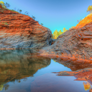 Stunning gorge with reflection into water at Karijini National Park
